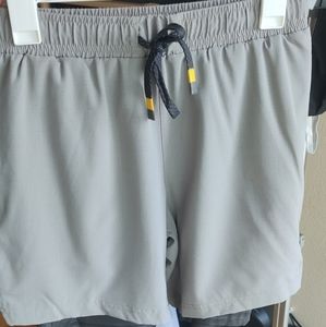 Hind workout shorts with two pockets and a back pocket zipper.